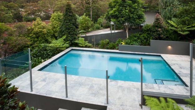 Pool with glass fencing